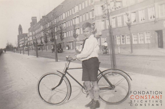 Constant and his brother Jan in Amsterdam on their bicycle's. 