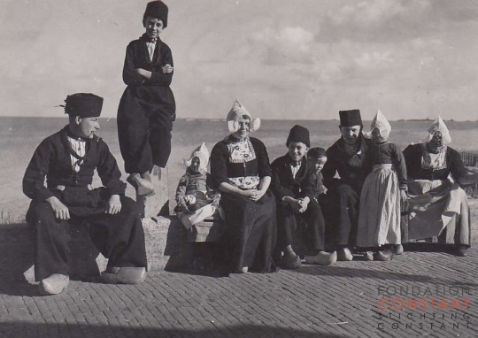 Constant, Jan and seven others in traditional Dutch costumes