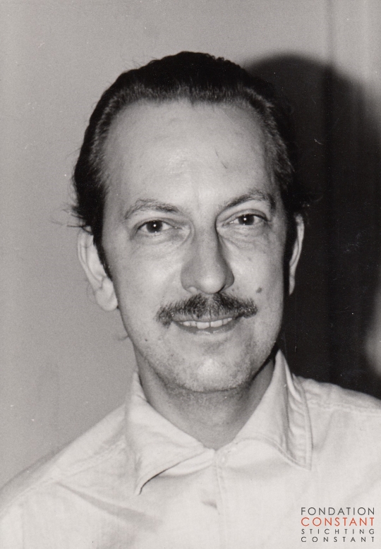 Portrait Constant wearing a white t-shirt