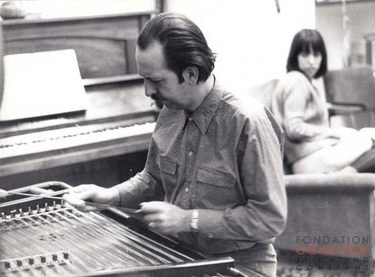Constant playing the cymbalom, with Martha in the background