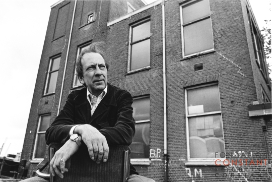 Constant in front of the building of his studio, 1980, Unknown