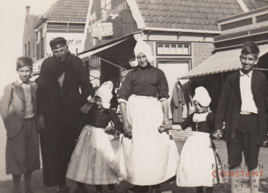 Constant, Jan and three others in traditional Dutch costumes