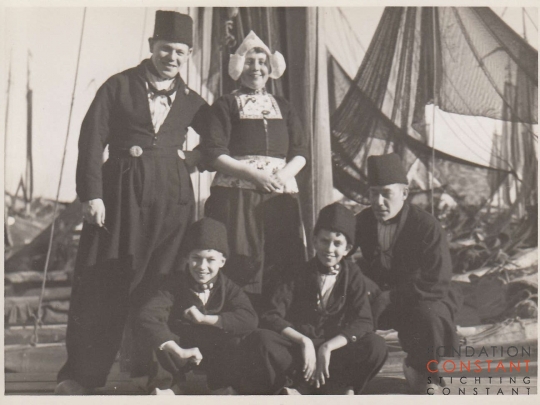 Constant, Jan and three others in traditional Dutch costumes