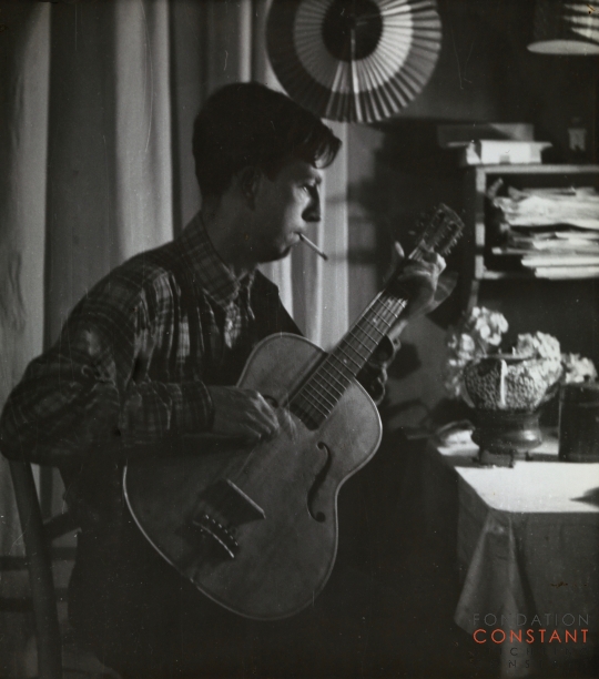 Constant playing guitar, 1949