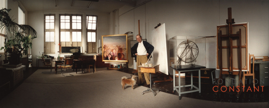 Constant Nieuwenhuys with his dog at his studio Wittenburg in 1997 