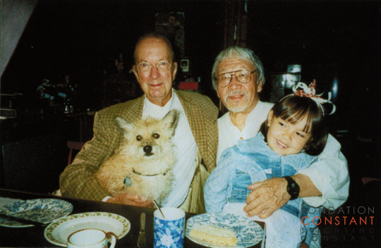 Constant Nieuwenhuys with his dog  Tikus and Tajiri with his granddaughter Tanea, 2000