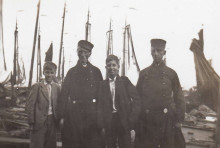 Constant, Jan and two other men in traditional Dutch costumes.