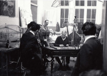 Constant makes music with Group of musicians