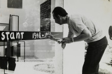 Constant Nieuwenhuys-Constant paints the door of the Dutch pavilion, 1966