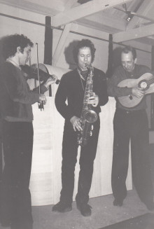 Constant is making music with two musicians